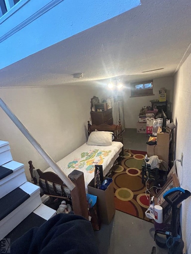 interior space featuring a textured ceiling