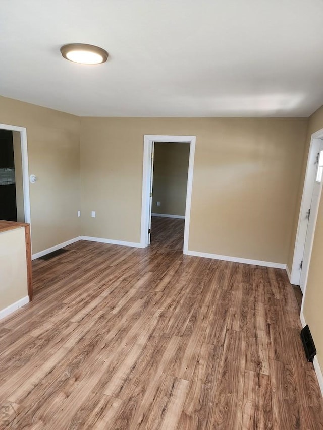 615 San Juan St, Trinidad, CO 81082 - empty room with wood finished floors and baseboards