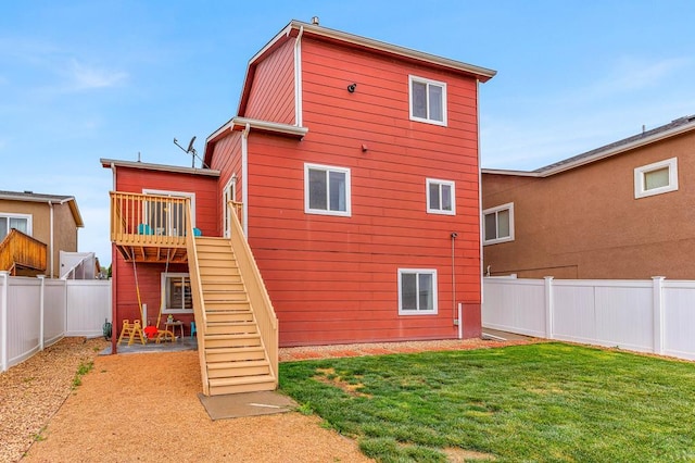 back of house with stairs and a wooden deck