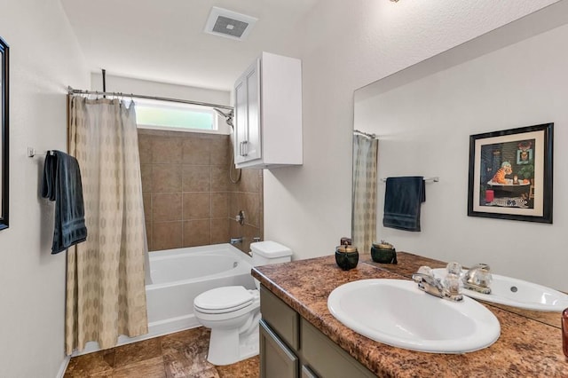 bathroom featuring toilet, vanity, and shower / bath combination with curtain