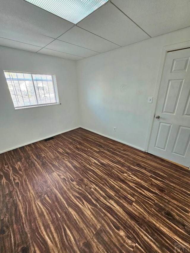 1337 Spruce St, Pueblo, CO 81004 - unfurnished room with dark wood-style floors and baseboards