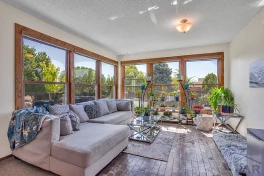 sunroom / solarium with a wealth of natural light