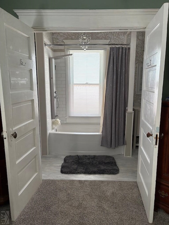 full bathroom featuring shower / bath combo with shower curtain