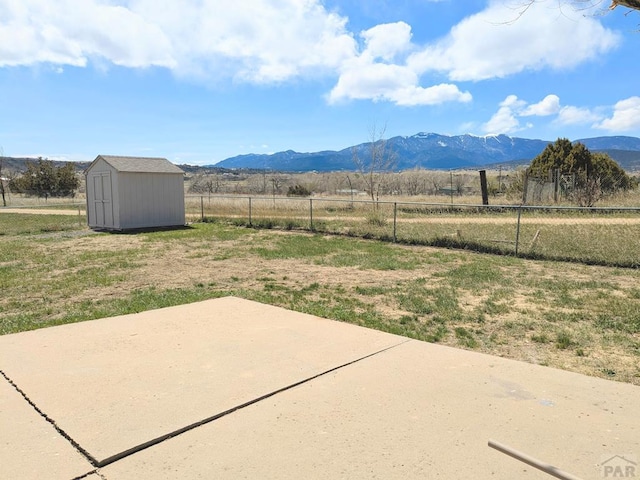 view of mountain feature with a rural view