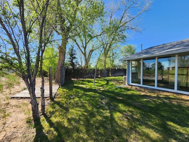 view of yard with fence