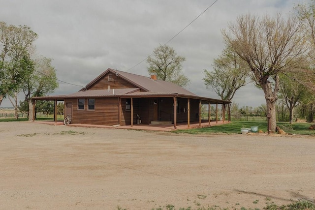 22661 Rd 24, La Junta, CO 81050 - view of front of property with a porch and driveway