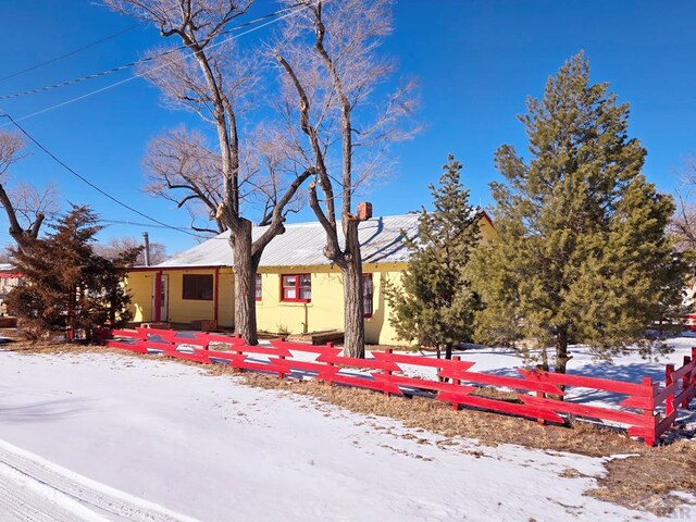 ranch-style house with stucco siding