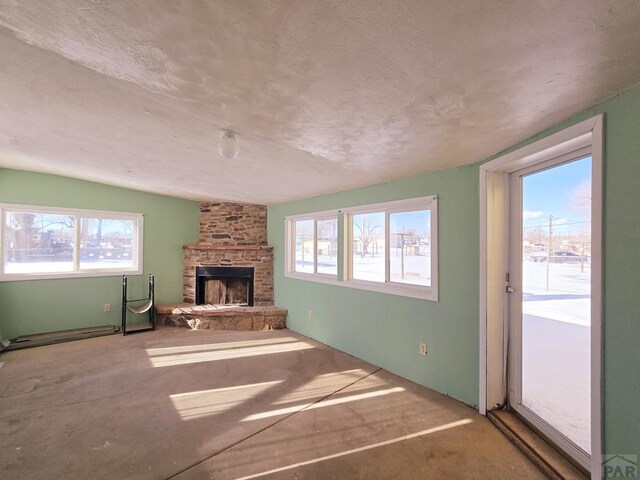 unfurnished living room with a fireplace