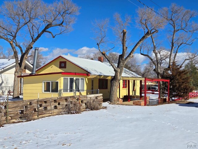 view of front of home with fence