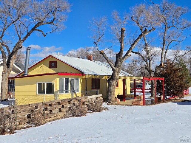 view of front of property with fence