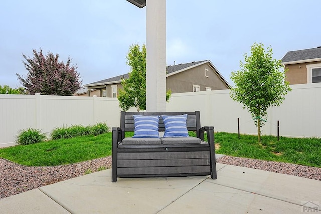 2221 Cliffmoor Ln, Pueblo, CO 81008 - fenced backyard with a patio area and an outdoor hangout area