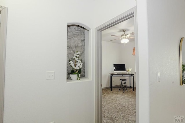2221 Cliffmoor Ln, Pueblo, CO 81008 - corridor featuring carpet flooring and an office area