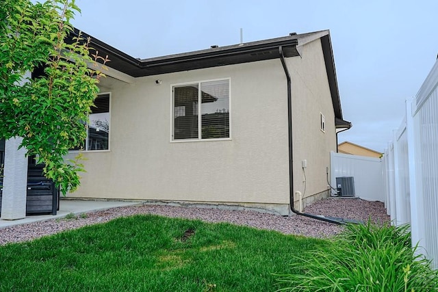 2221 Cliffmoor Ln, Pueblo, CO 81008 - view of property exterior with stucco siding and central air condition unit