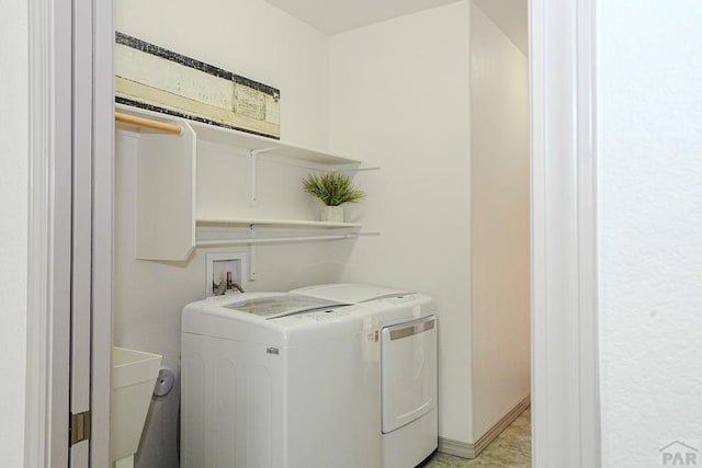 2221 Cliffmoor Ln, Pueblo, CO 81008 - washroom featuring separate washer and dryer