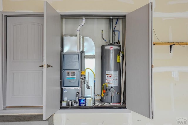 2221 Cliffmoor Ln, Pueblo, CO 81008 - utility room with gas water heater