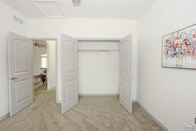 2221 Cliffmoor Ln, Pueblo, CO 81008 - unfurnished bedroom featuring light carpet, a closet, and baseboards