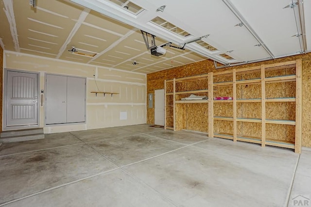 2221 Cliffmoor Ln, Pueblo, CO 81008 - garage featuring a garage door opener