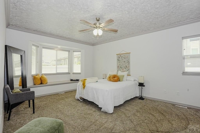 2221 Cliffmoor Ln, Pueblo, CO 81008 - bedroom featuring a textured ceiling, carpet floors, ornamental molding, baseboards, and a ceiling fan