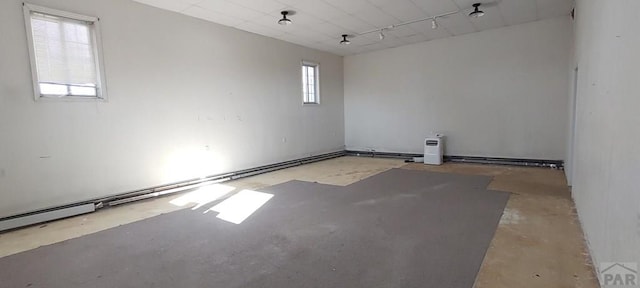 unfurnished room featuring concrete flooring