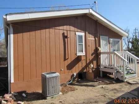 326 Katherine St, Avondale, CO 81022 - view of property exterior featuring central AC unit