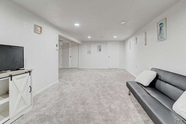 sitting room with carpet, baseboards, and recessed lighting