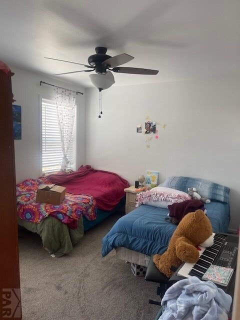 bedroom featuring carpet and ceiling fan