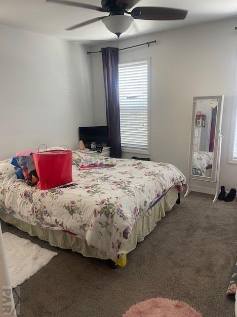 bedroom featuring carpet flooring and a ceiling fan