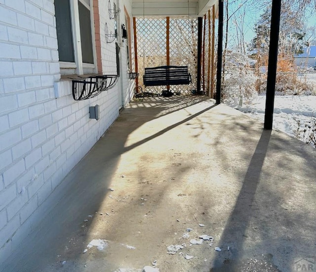 view of snow covered patio