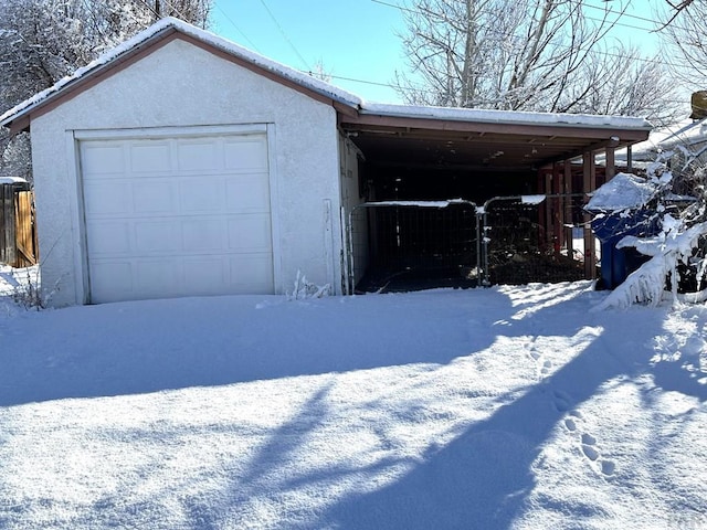 900 Van Buren St, Pueblo, CO 81004 - view of snow covered garage