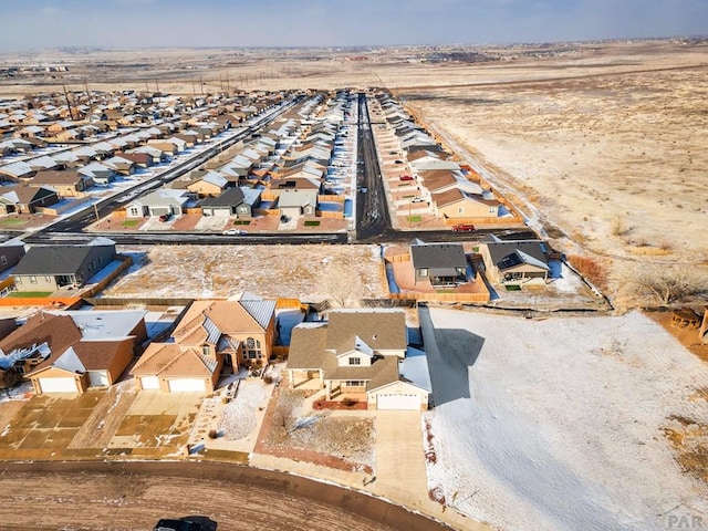 birds eye view of property with a residential view