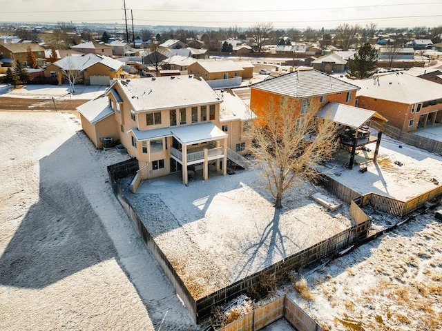 birds eye view of property with a residential view