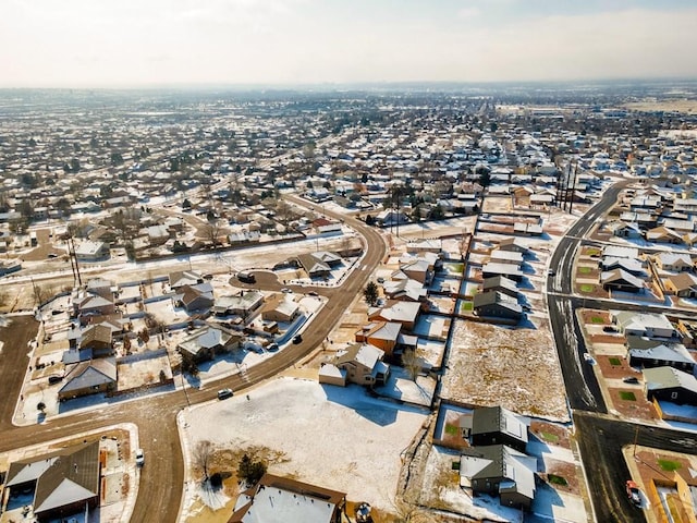 birds eye view of property with a residential view