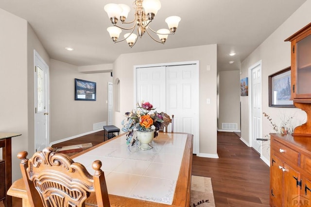 dining area with arched walkways, recessed lighting, visible vents, baseboards, and dark wood-style floors