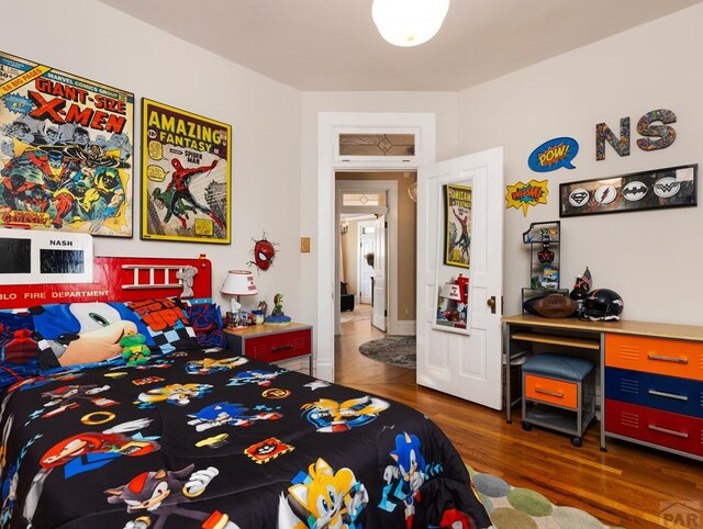 bedroom featuring dark wood-type flooring