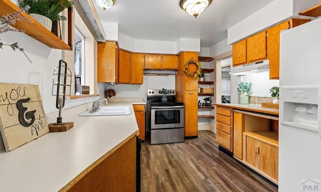 kitchen featuring open shelves, light countertops, electric range, a sink, and white fridge with ice dispenser