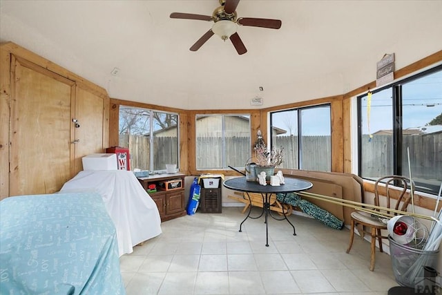 interior space featuring ceiling fan