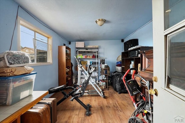 exercise area with wood finished floors