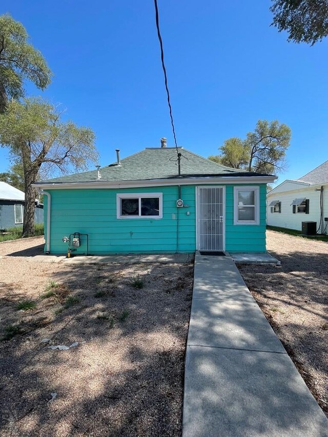 view of front of property with cooling unit