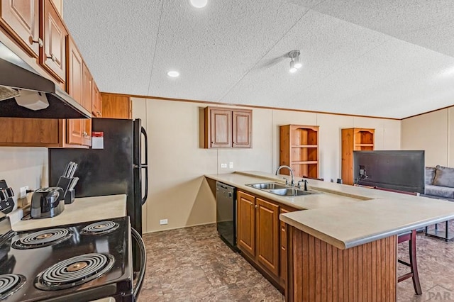 kitchen with a sink, black electric range, a breakfast bar, dishwasher, and a peninsula