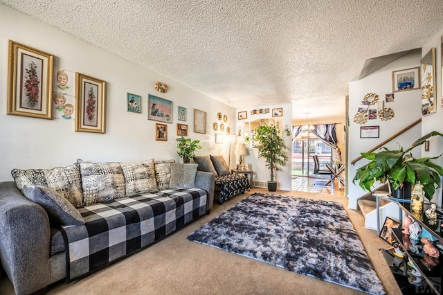 carpeted living room featuring a textured ceiling