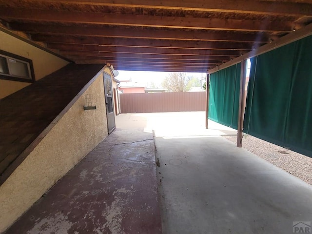 view of patio featuring fence