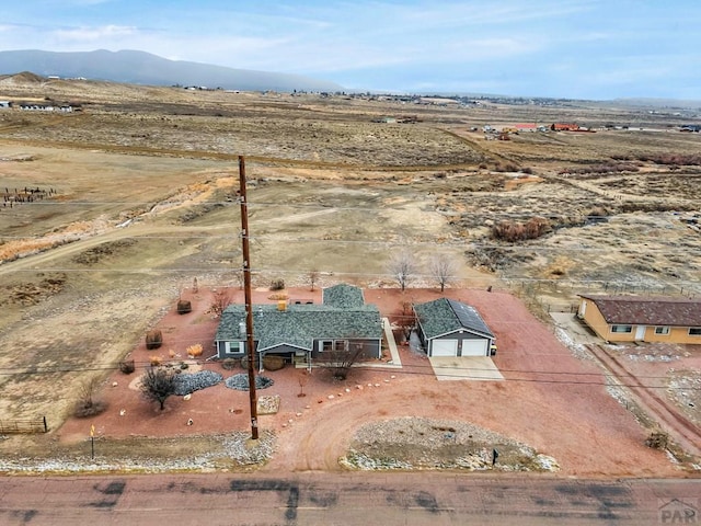 bird's eye view with a mountain view