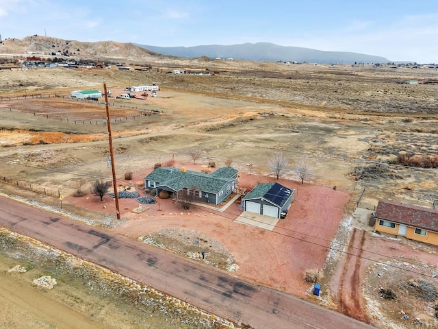 aerial view featuring a rural view and a mountain view