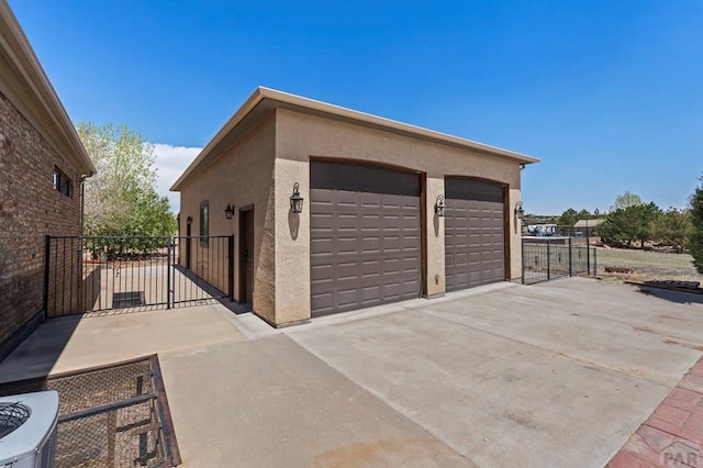 detached garage with fence