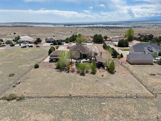 aerial view with a residential view and a water view