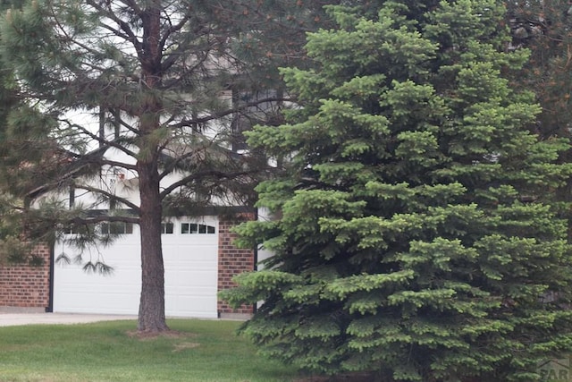 garage featuring driveway