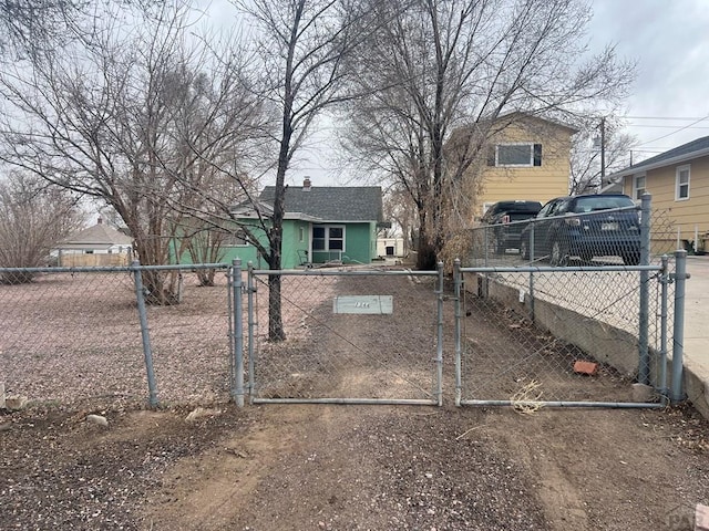 view of front of property featuring a gate and a fenced front yard