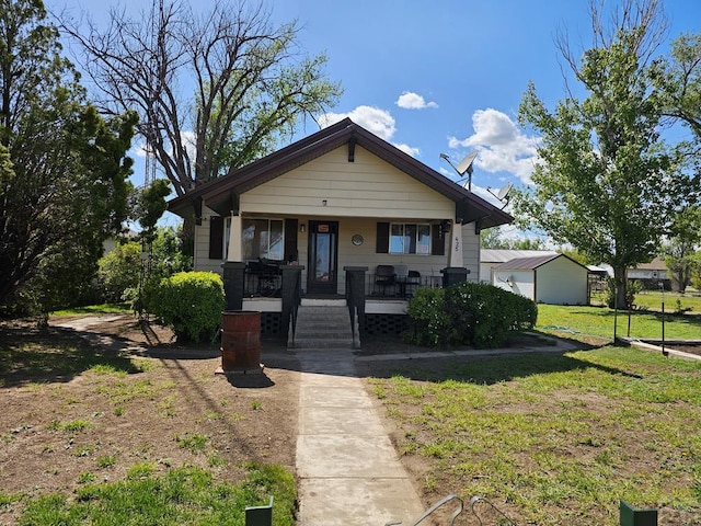 425 Randolph St, Pritchett, CO 81064 - bungalow-style home featuring a porch and a front yard
