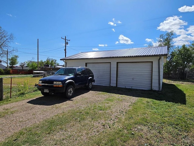 425 Randolph St, Pritchett, CO 81064 - detached garage featuring fence