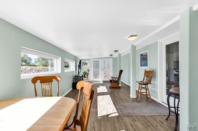 181 6th St, Penrose, CO 81240 - dining room with wood finished floors, baseboards, and french doors